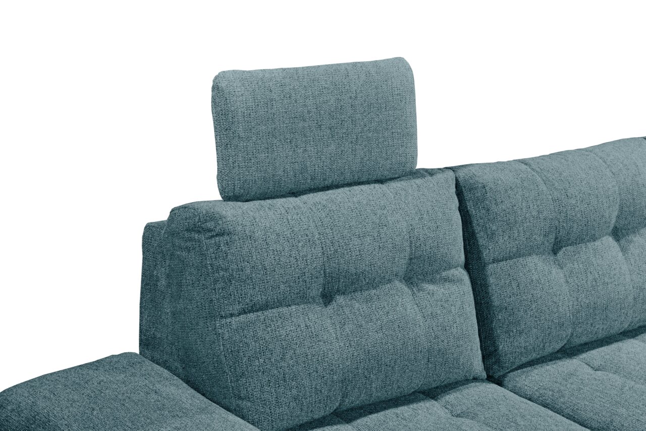Nahaufnahme einer modernen, gepolsterten Sofaecke in Blaugrün mit verstellbarer Kopfstütze, seitliche Perspektive.