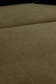 Close-up van een beige, grof geweven bekledingsoppervlak met zichtbare naad; perspectief: licht schuin van bovenaf.