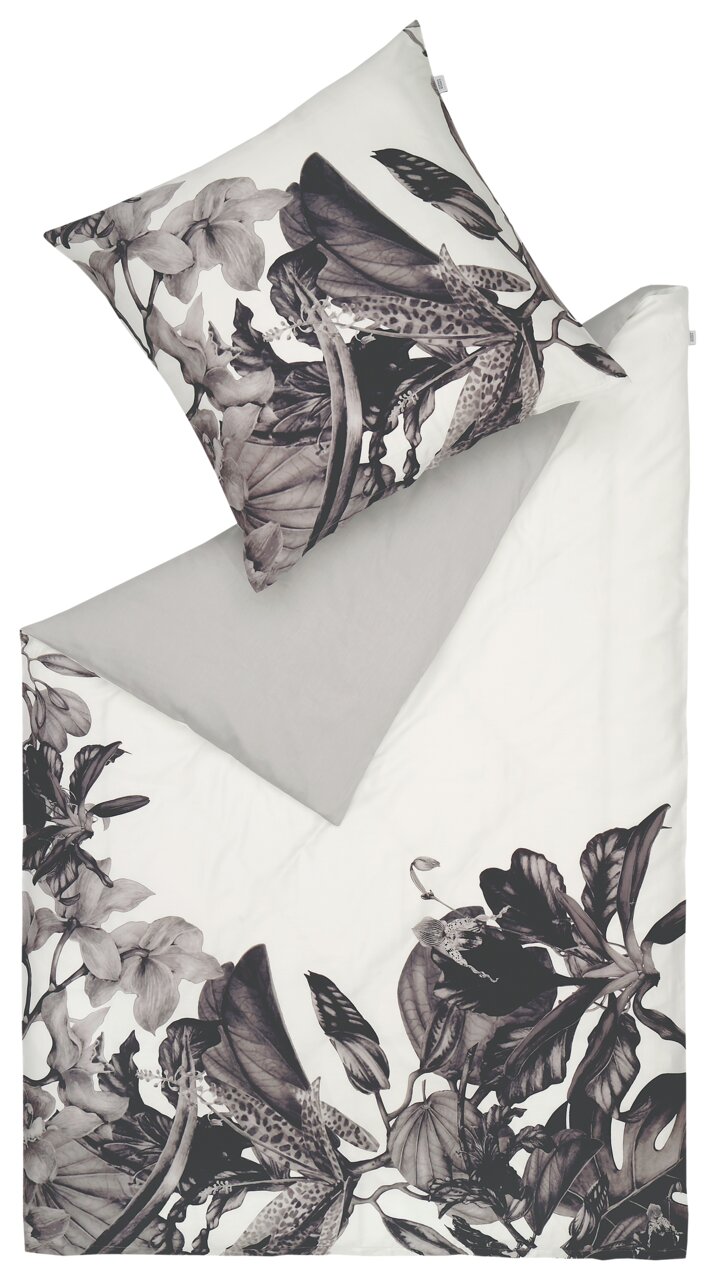 Schöner Wohnen Bettwäsche AMALIA Satin-Bettwäsche-Set AMALIA mit floralem Muster in Schwarz-Weiß, bestehend aus einem Kissenbezug und einem Bettdeckenbezug, aus der Vogelperspektive fotografiert.