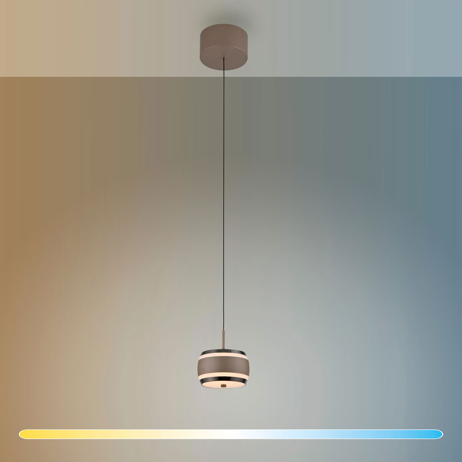 Moderne LED-Pendelleuchte in seitlicher Perspektive, hängend an einem dünnen Kabel mit zylindrischem Lampenschirm.