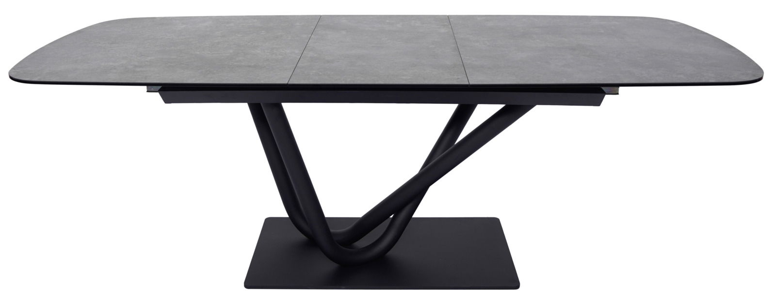 Moderner Esstisch mit grauer Tischplatte und schwarzem, skulpturalem Untergestell, seitliche Perspektive.