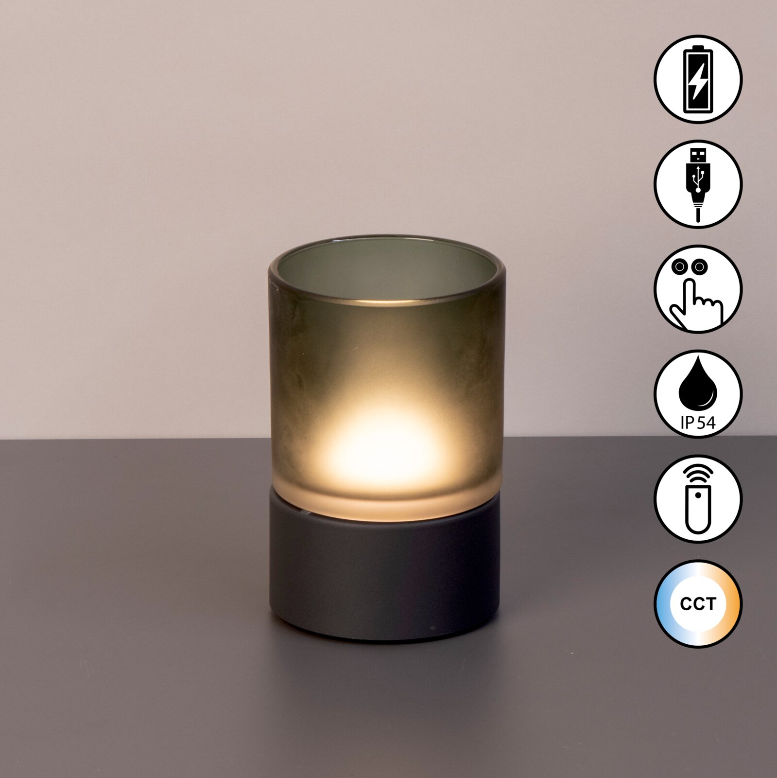Akku-Windlicht mit zylindrischem Glasaufsatz auf dunklem Sockel, seitliche Ansicht. Symbole für USB-Ladung, Touch-Bedienung, IP54-Schutz, Fernbedienung und CCT-Farbtemperatur.