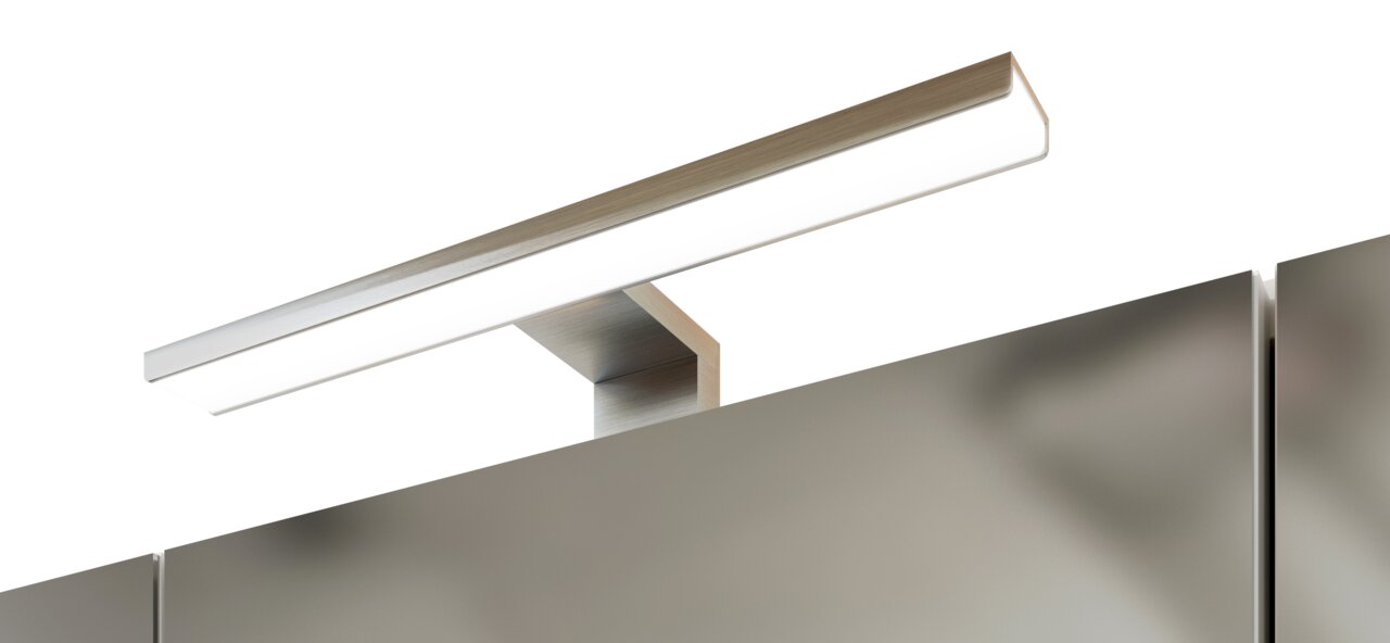 Nahaufnahme eines modernen Spiegelschranks mit integrierter LED-Leuchte von oben betrachtet.