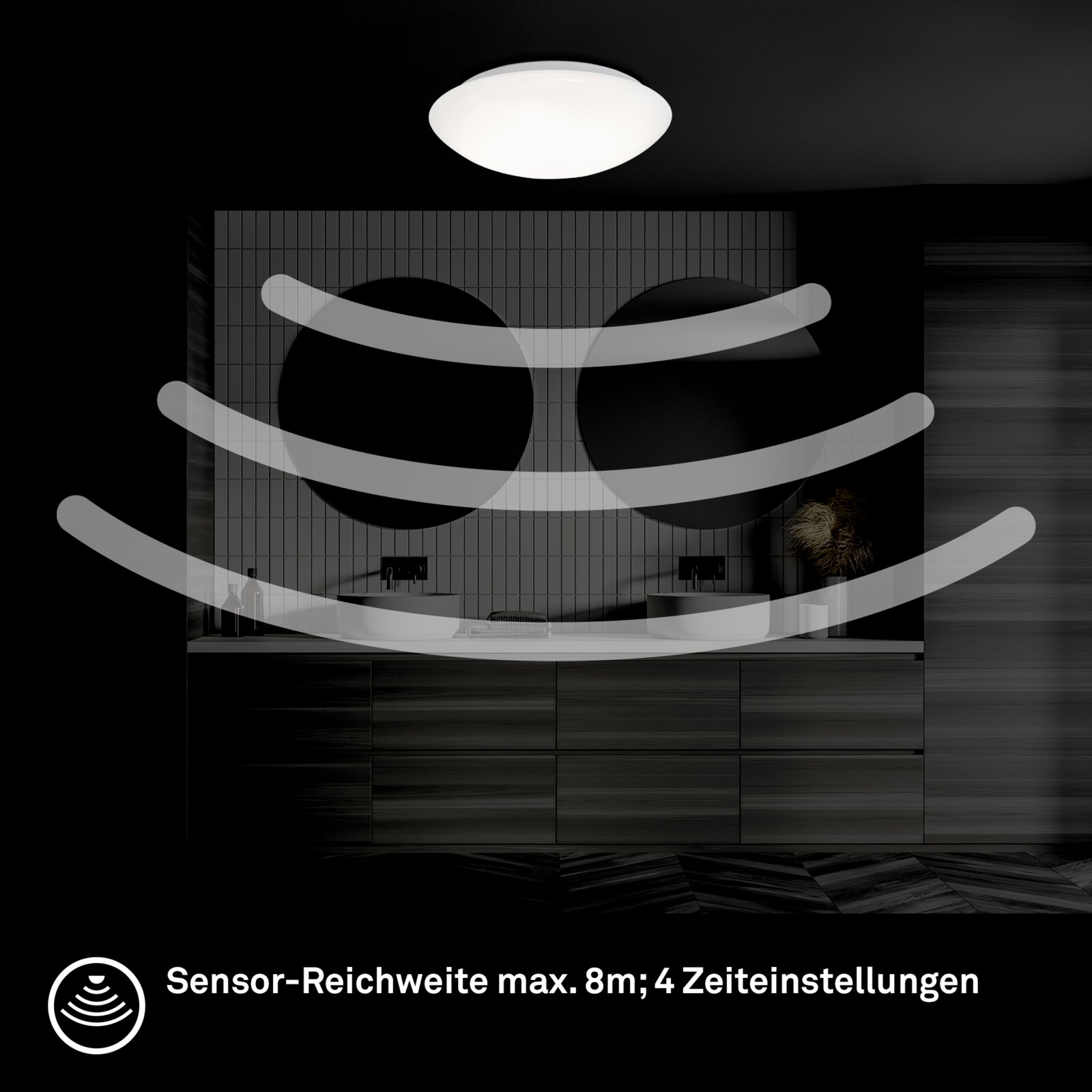 Witte plafondlamp met bewegingssensor in moderne badkamer boven dubbele wastafel, frontaal aanzicht; sensorbereik tot 8 m met 4 tijdsinstellingen.