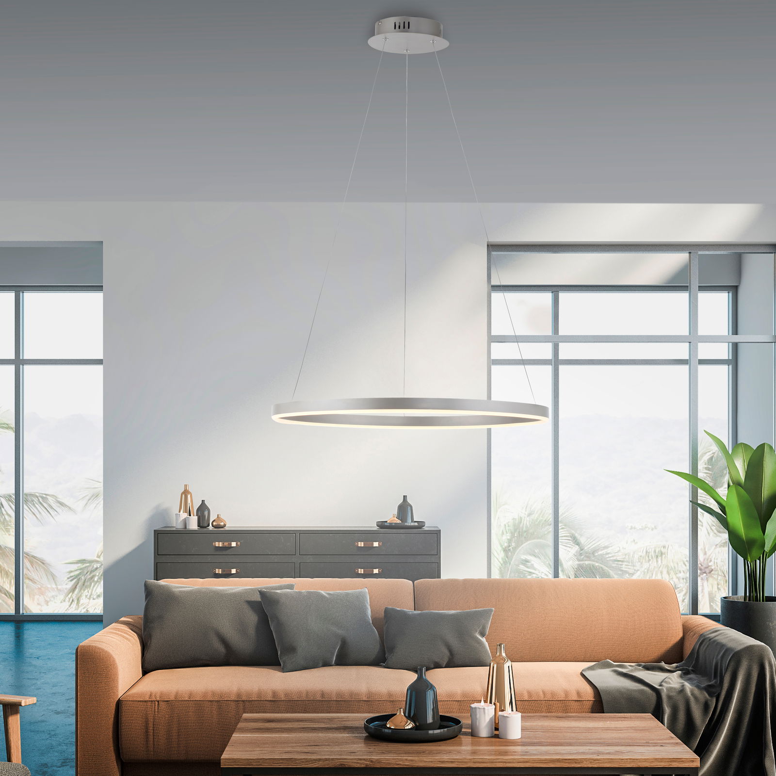 Moderne Pendelleuchte RITUS in einem stilvollen Wohnzimmer, seitliche Perspektive