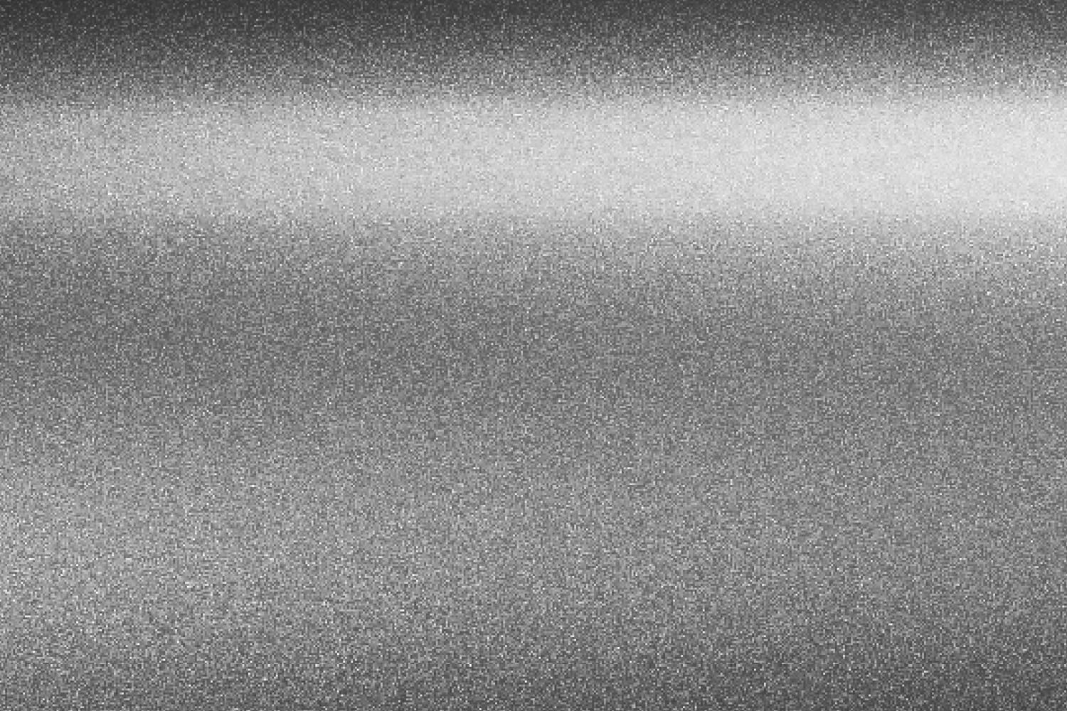 Nahaufnahme der silbernen Oberfläche einer Küchenmaschine