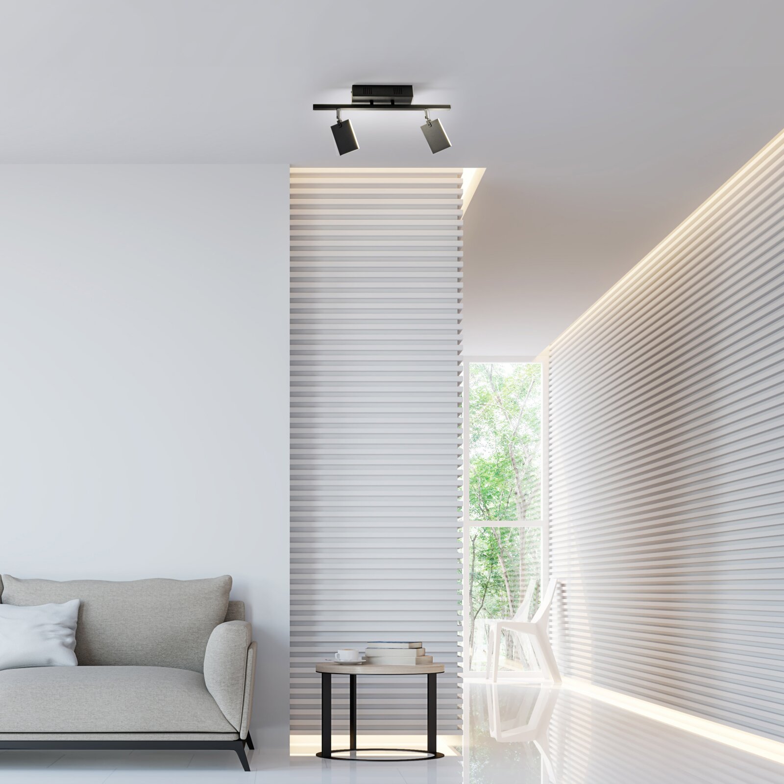 Moderne zwarte plafondlamp met twee verstelbare spotjes, gezien van onderaf in een stijlvolle woonkamer met bank en bijzettafel.
