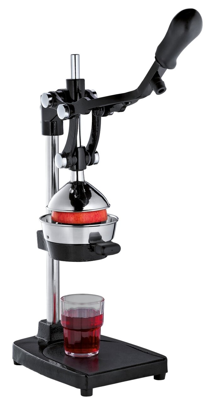 Professionele granaatappelpers LIVORN in zijaanzicht, met daaronder een glas versgeperst sap.