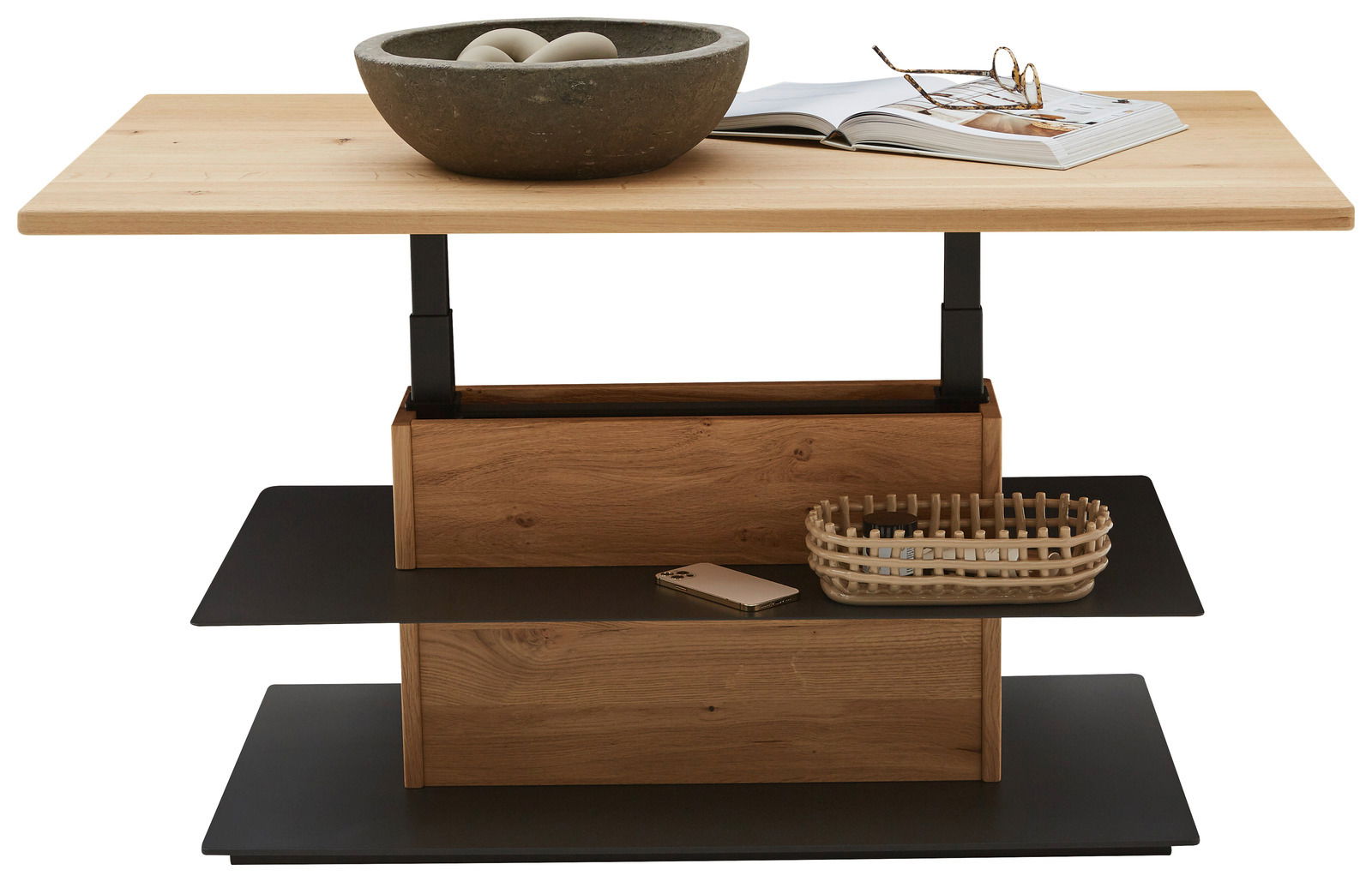 Moderner Couchtisch aus Holz mit zwei schwarzen Ablagen, dekoriert mit einer Schale und einem Buch, frontal betrachtet.