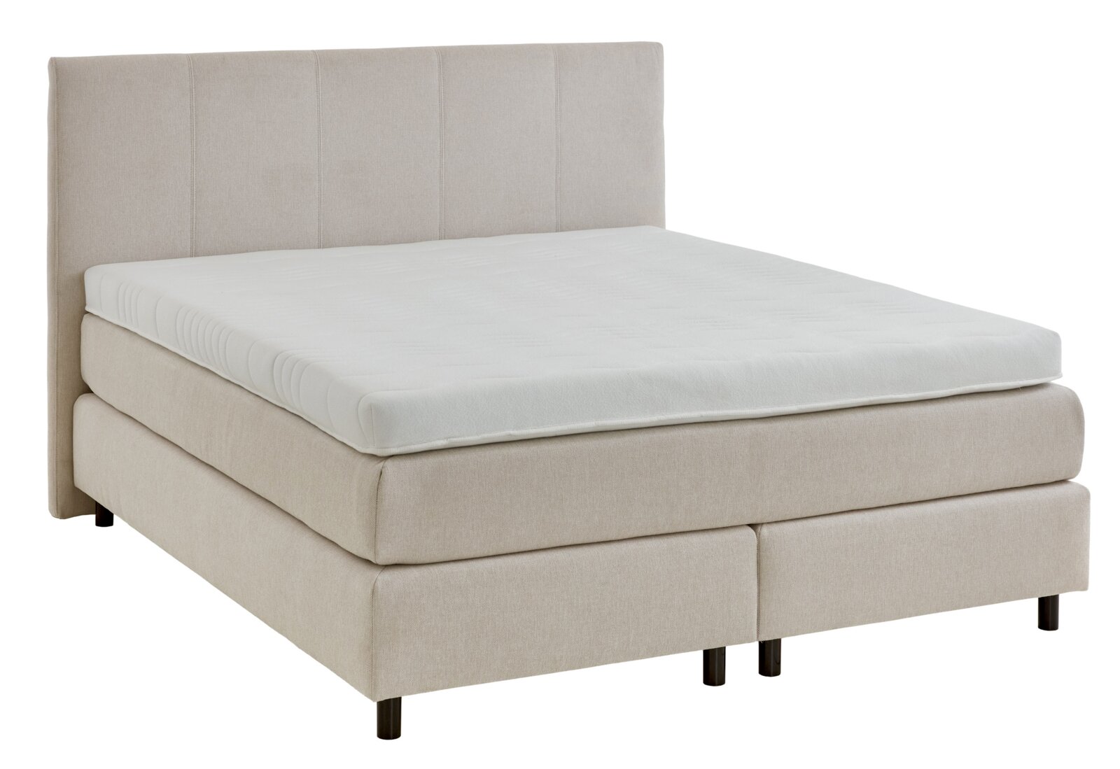 Boxspringbed in beige, gezien vanaf de zijkant