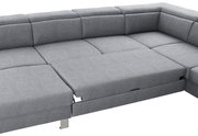 Graues Ecksofa mit Bettfunktion, Perspektive von oben.