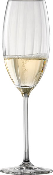 Prizma-champagneglas gevuld met mousserende wijn, zijaanzicht