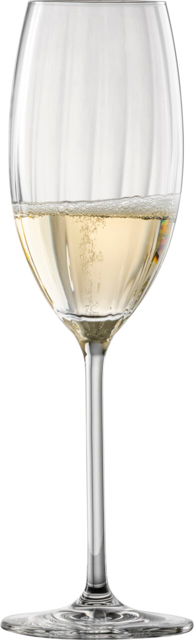 Prizma-champagneglas gevuld met mousserende wijn, zijaanzicht