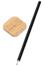 WC-Rollenhalter mit quadratischer Bambus-Basis und schwarzem Stab, aus der Vogelperspektive fotografiert.