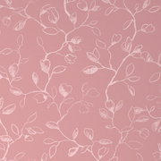 Roze beddengoed met een wit bloemenpatroon, bovenaanzicht