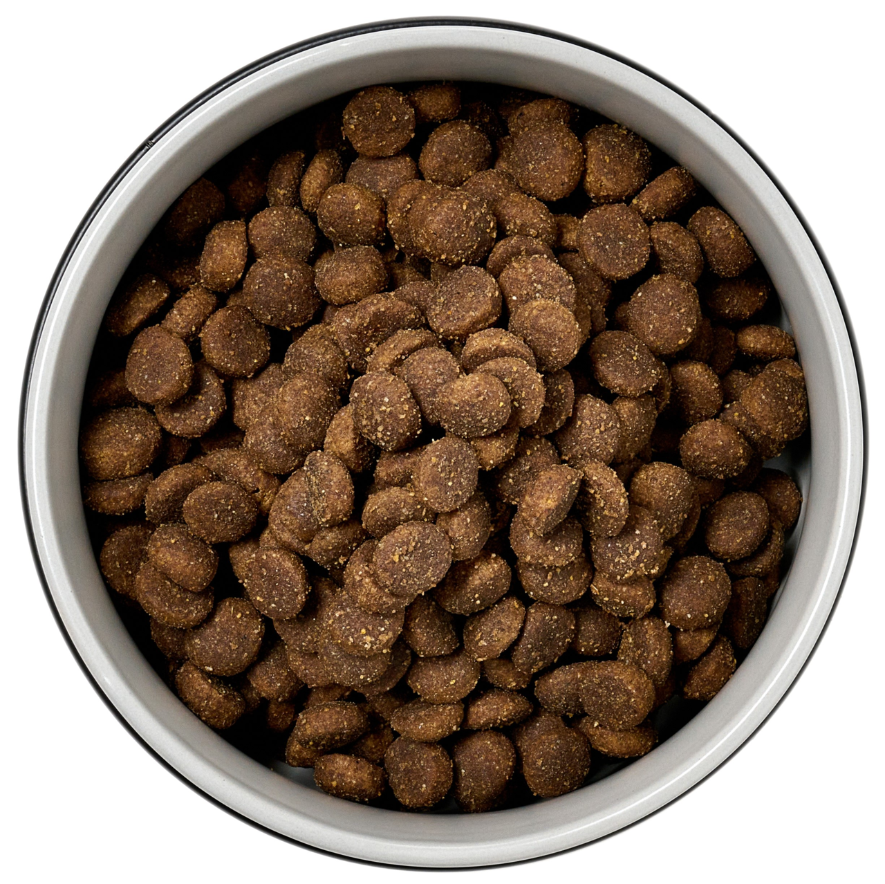 Vogelperspektive auf einen Napf mit braunem Trockenfutter, geeignet für Haustiere.