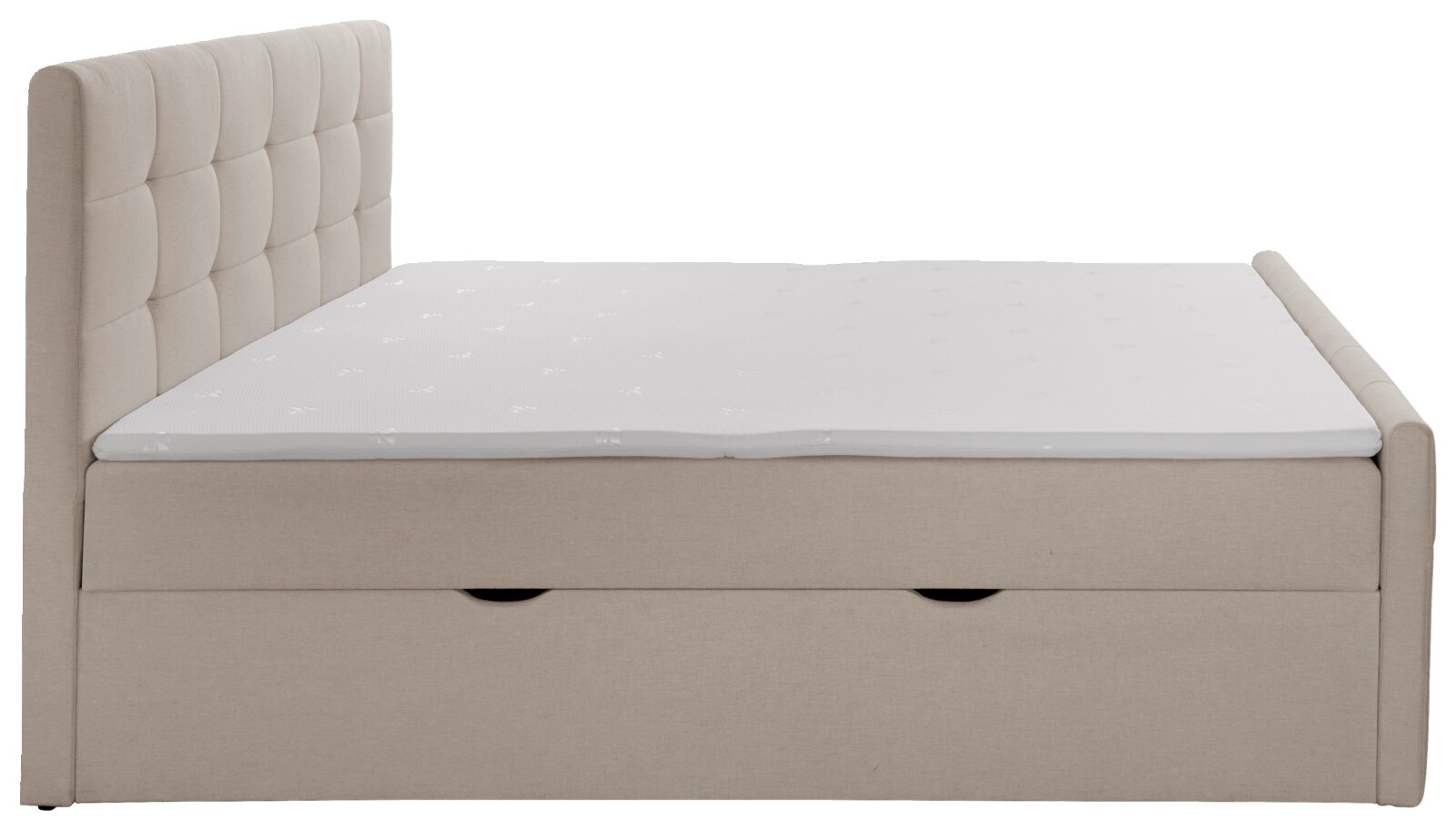 Zijaanzicht van een beige boxspring met gestoffeerd hoofdeinde en opbergruimte.