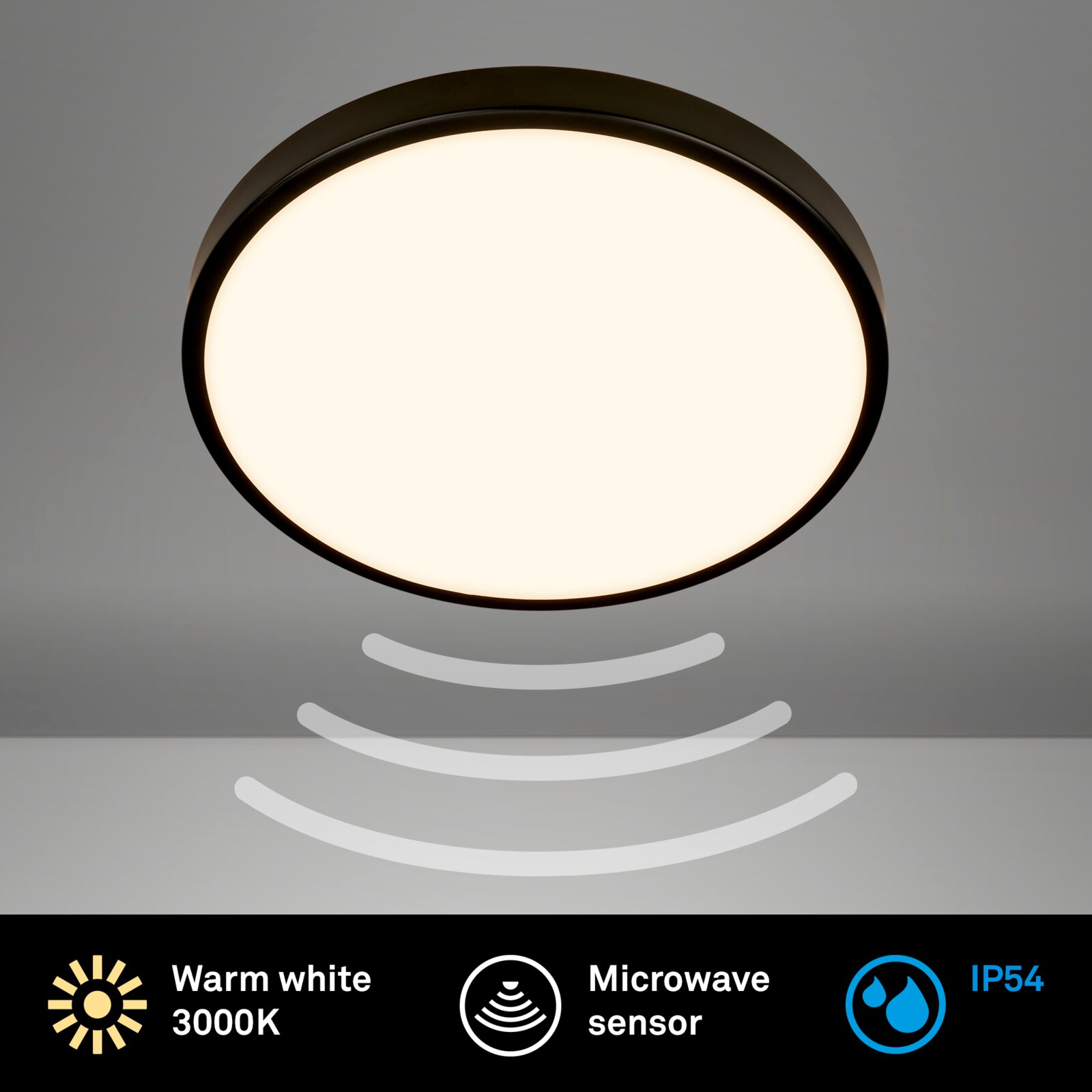 Ronde LED plafondlamp met zwarte rand en warmwit licht (3000K), met geïntegreerde microgolfsensor en IP54-bescherming, getoond in onderaanzicht van onderaf tegen een grijze achtergrond.
