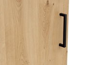 Nahaufnahme einer Holzkommode mit schwarzem Griff, seitliche Perspektive