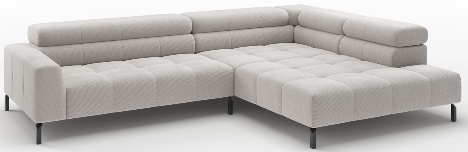 Lichtgrijze L-vormige hoekbank met chaise longue rechts, gecapitonneerde zitting en rugkussens en zwarte metalen poten, schuin van voren gefotografeerd