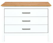 Frontansicht einer Kücheninsel mit drei weißen Schubladen und einer Holzoberfläche.