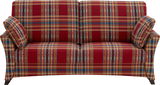 Vorderansicht eines dreisitzigen Sofas mit rot-kariertem Muster und zwei passenden Kissen.