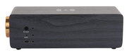 Seitenansicht eines Radioweckers mit Bluetooth-Lautsprecher, Holzoptik und goldfarbenem Drehknopf.