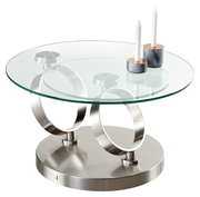 Moderner Couchtisch mit runder Glasplatte und zwei Kerzenhaltern, seitliche Perspektive