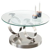 Moderner Couchtisch mit runder Glasplatte und zwei Kerzenhaltern, seitliche Perspektive