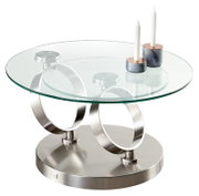 Moderner Couchtisch mit runder Glasplatte und zwei Kerzenhaltern, seitliche Perspektive