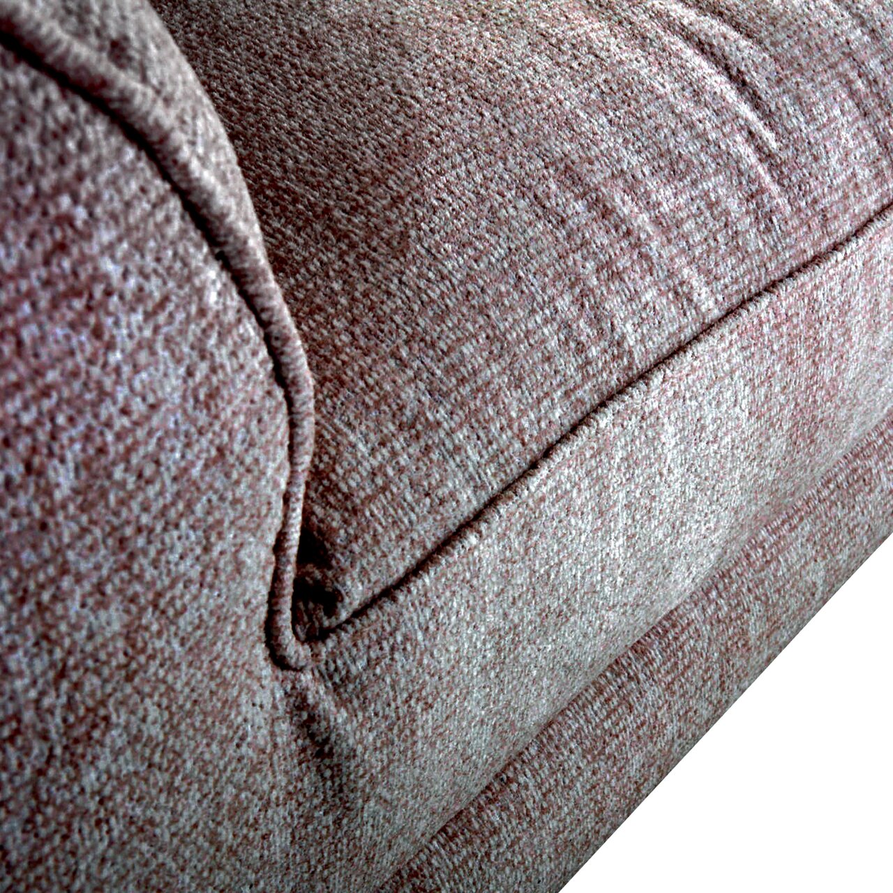 Close-up van een Big Sofa ROMANTICO met gestructureerde stoffen bekleding, gezien vanuit een zijdelingse hoek.