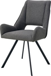 Gepolsterter Esszimmerstuhl mit Armlehnen in dunkelgrauem Stoffbezug und schwarzen Metallbeinen, schräg von vorne links fotografiert