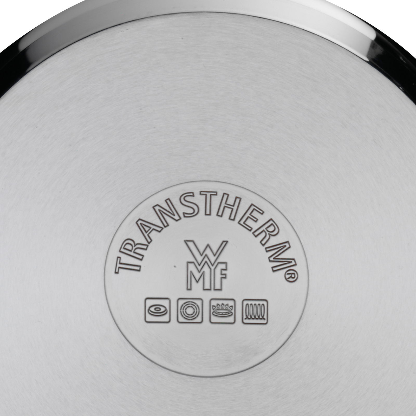 Blick auf den Boden eines WMF Extrabräters mit TransTherm-Logo und Symbolen für verschiedene Herdarten.