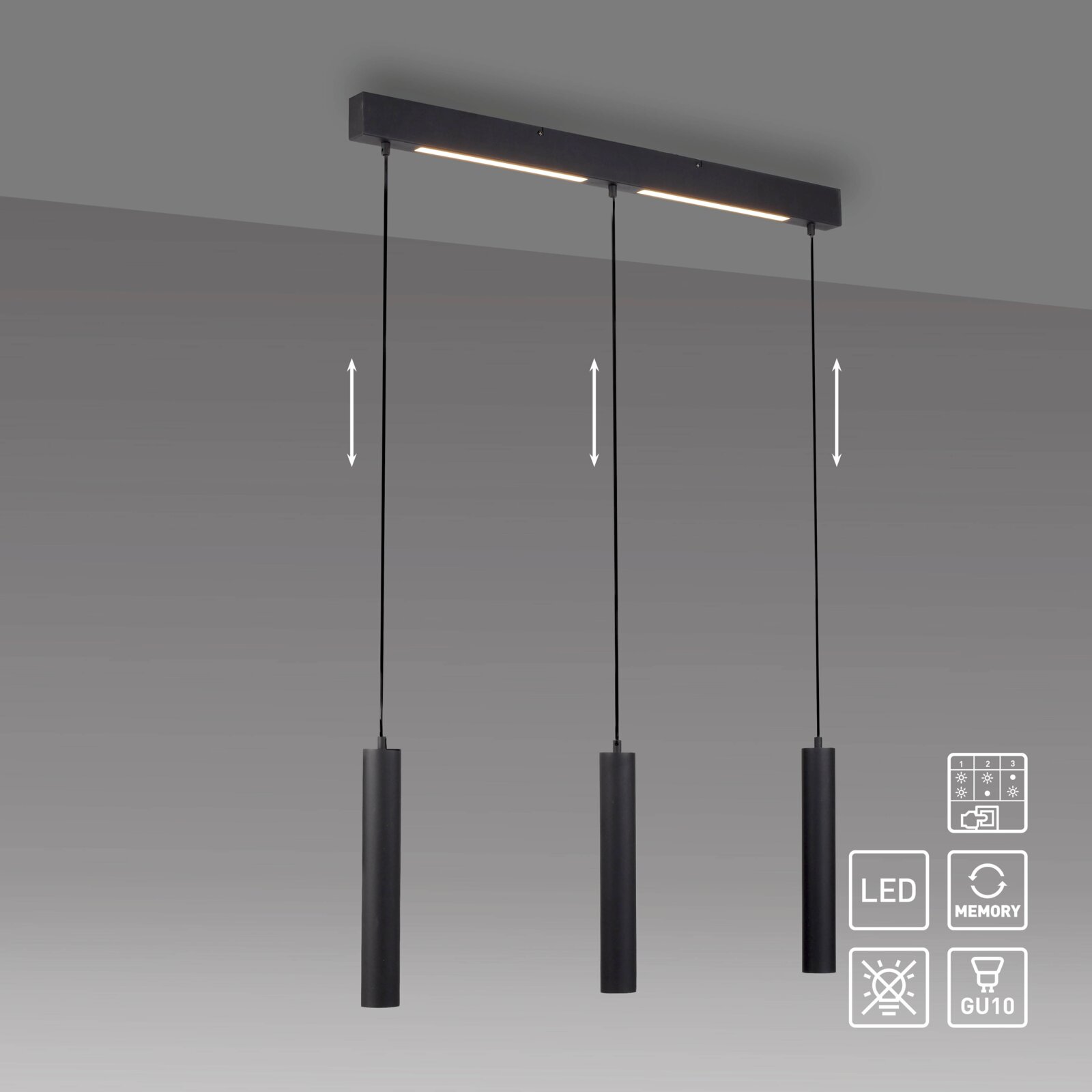 Moderne schwarze LED-Pendelleuchte mit drei zylindrischen Lampenschirmen an höhenverstellbaren Kabeln, an rechteckigem Baldachin montiert; Ansicht schräg von unten.