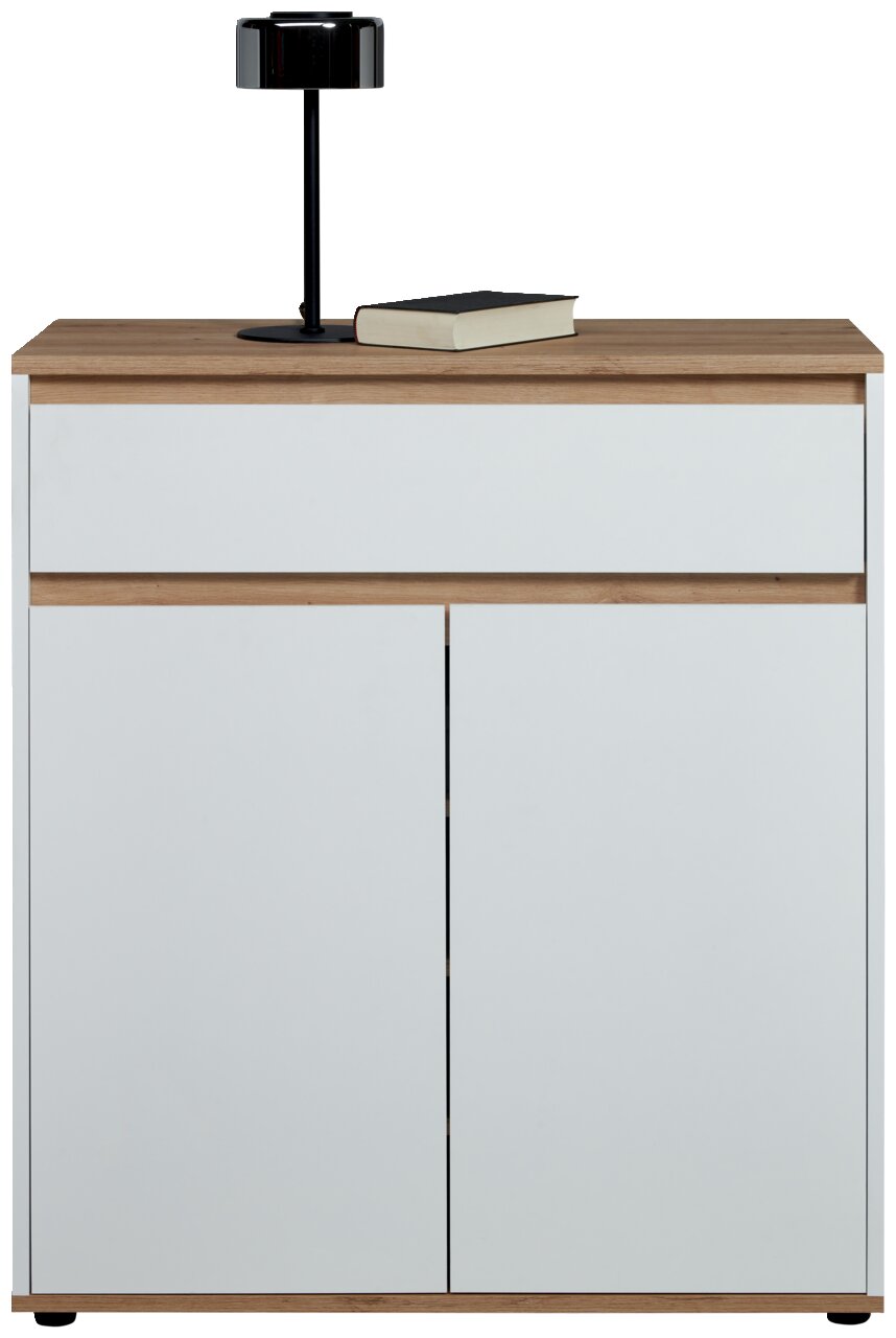 Moderne ladekast in wit met houten details, afgebeeld van voren, met een zwarte lamp en een boek op het blad.