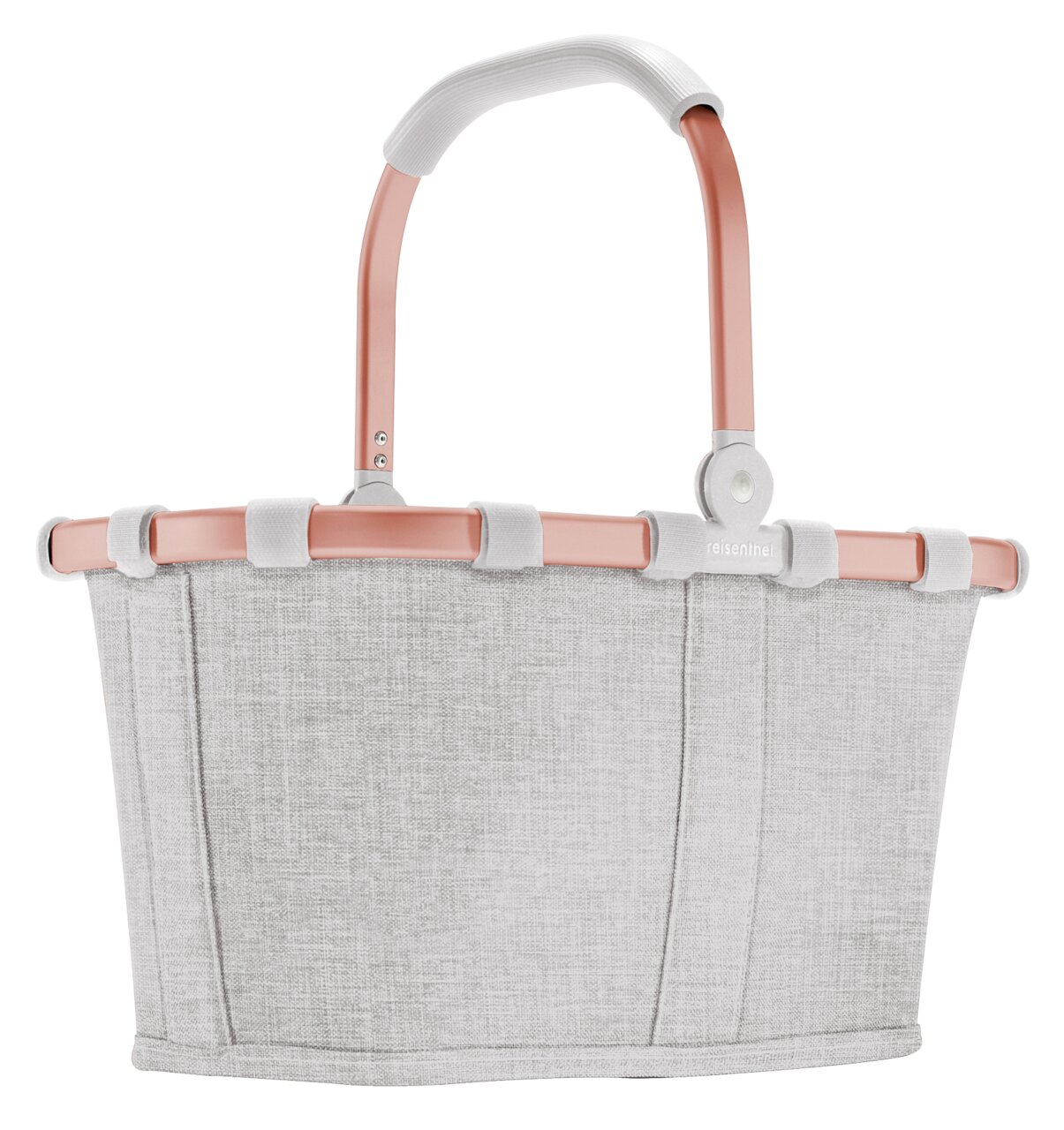Kompakter Einkaufskorb in hellem Stoff mit roséfarbenem Griff, seitliche Ansicht