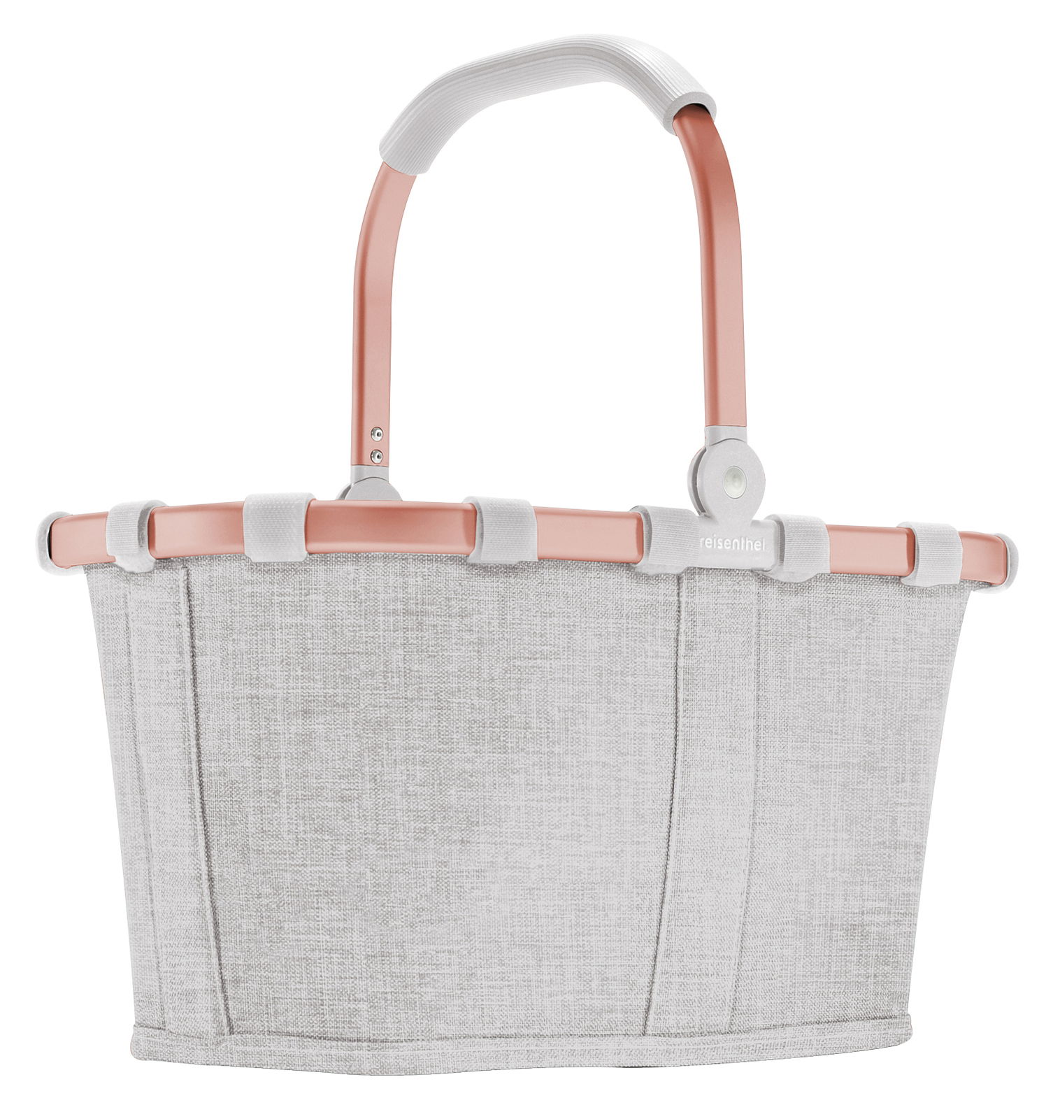 Kompakter Einkaufskorb in hellem Stoff mit roséfarbenem Griff, seitliche Ansicht