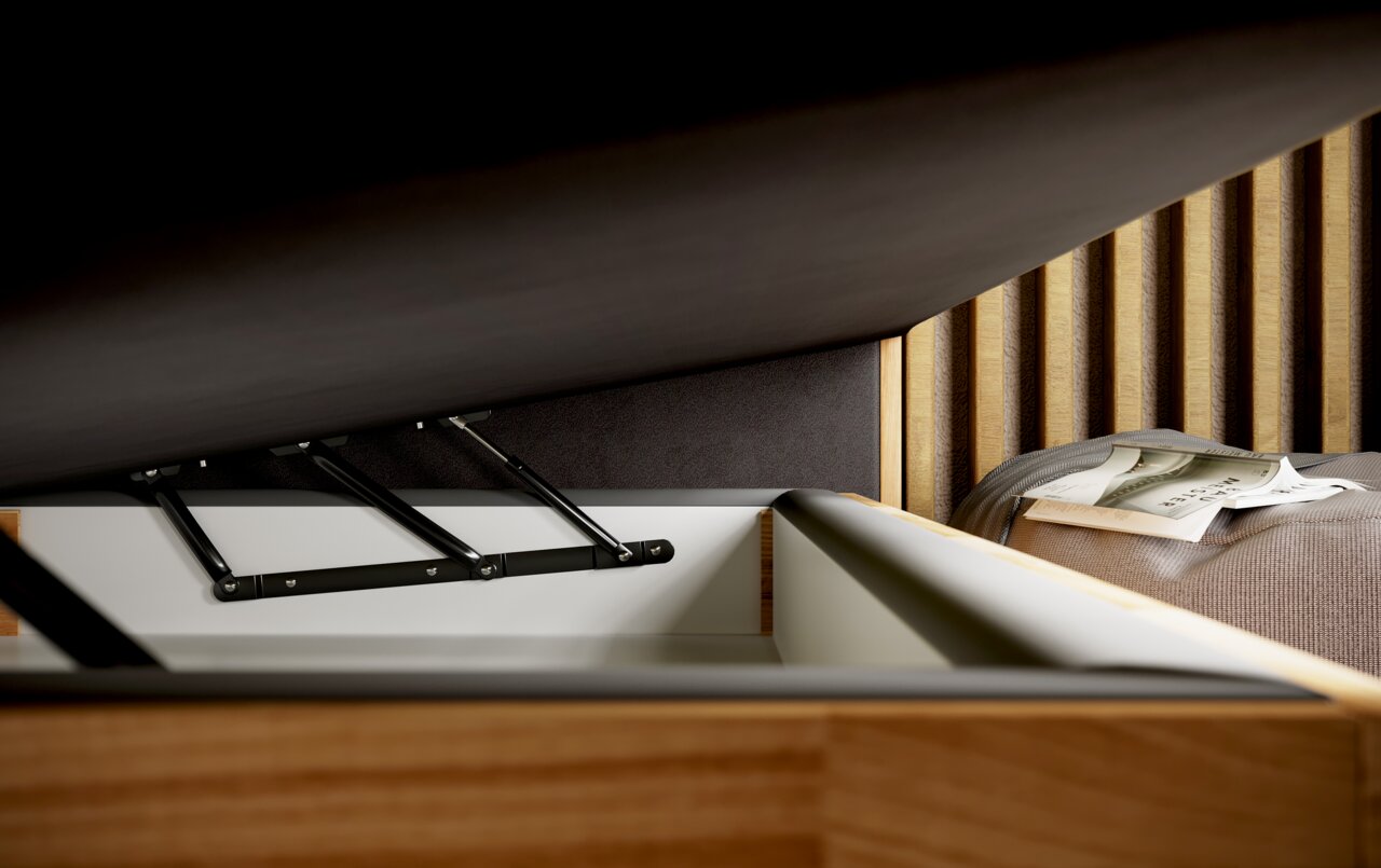 Nahaufnahme eines geöffneten Boxspringbetts mit Stauraum, seitliche Perspektive