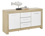 Sideboard aus Holz mit weißer Front, zwei Türen und drei Schubladen, dekoriert mit einer Fischskulptur und Zeitschriften, seitliche Perspektive
