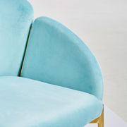 Türkiser Sessel mit goldenen Akzenten, Nahaufnahme von der Seite