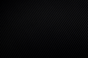 Nahaufnahme eines schwarzen, strukturierten Stoffes in diagonaler Perspektive