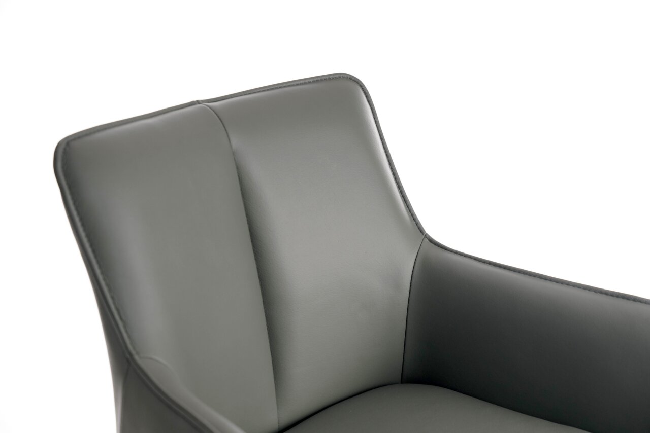 Nahaufnahme eines grauen Barhockersitzes mit glatter Polsterung, seitliche Perspektive