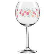 Cocktailglas mit buntem Fruchtmuster, seitliche Perspektive