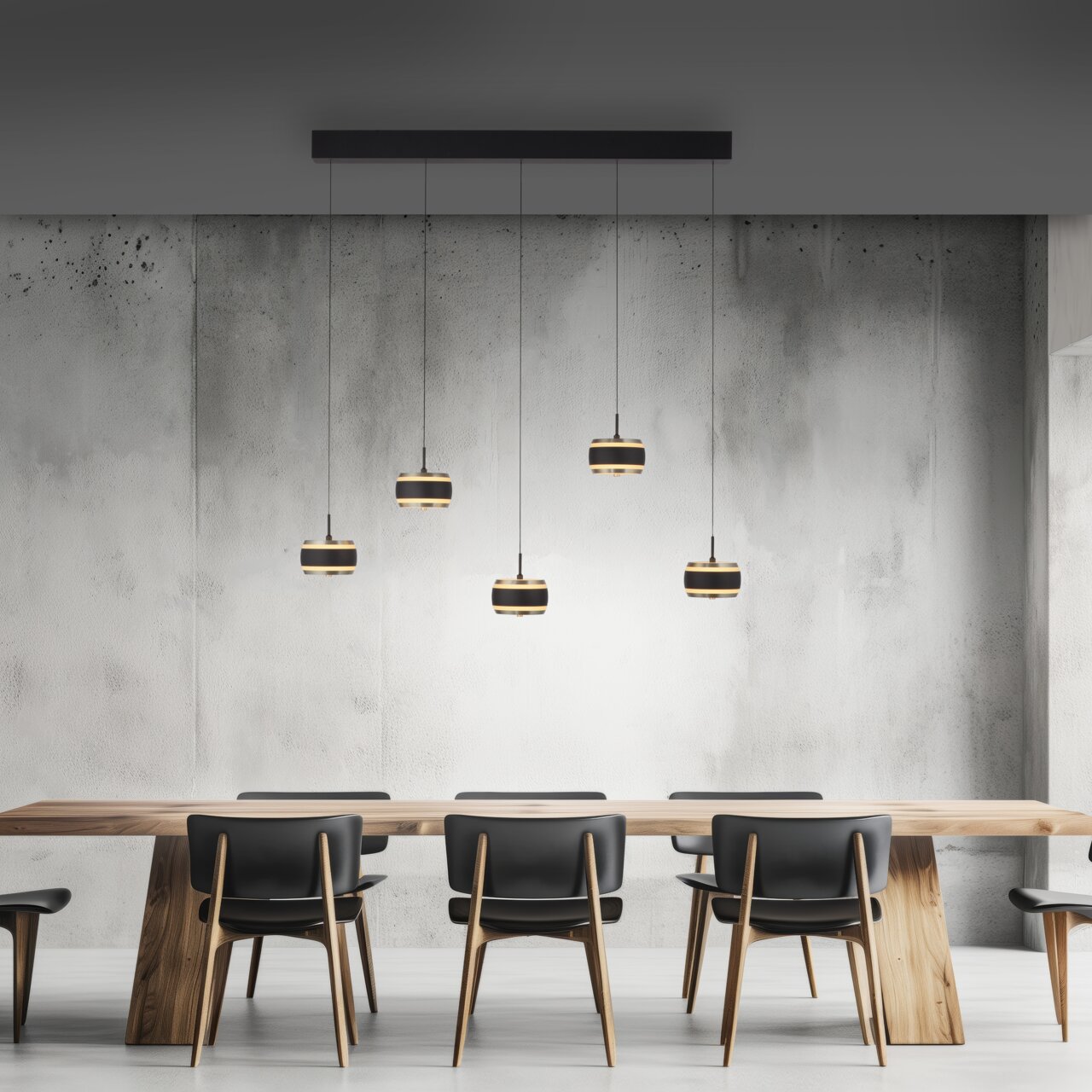 Neuhaus Pure LED-hanglamp PURE FALLING RINGS Moderne LED-hanglamp met vijf hangende lampen boven een eettafel, gezien vanaf de zijkant.