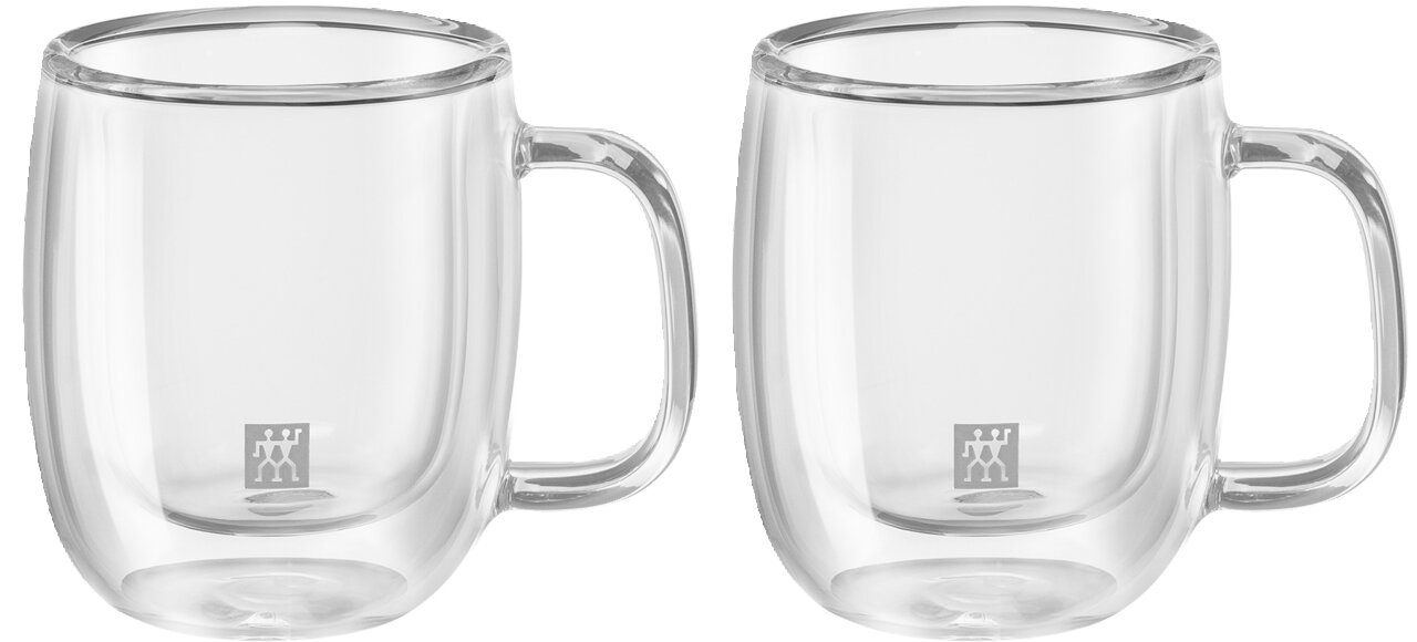Twee doorzichtige espressokopjes van dubbelwandig glas met oor, afgebeeld van voren.