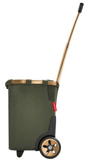 Seitenansicht eines grünen carrycruisers mit goldfarbenem Griff und Rädern.