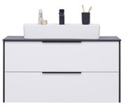 Frontale Ansicht eines modernen Waschtisch-Sets mit weißem Waschbecken, zwei Schubladen und schwarzen Akzenten.