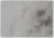Grauer Fellteppich in Draufsicht mit leichtem Farbverlauf und weicher Textur