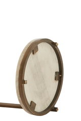 Nahaufnahme der Unterseite eines runden Beistelltisches mit Metallrahmen, seitliche Perspektive