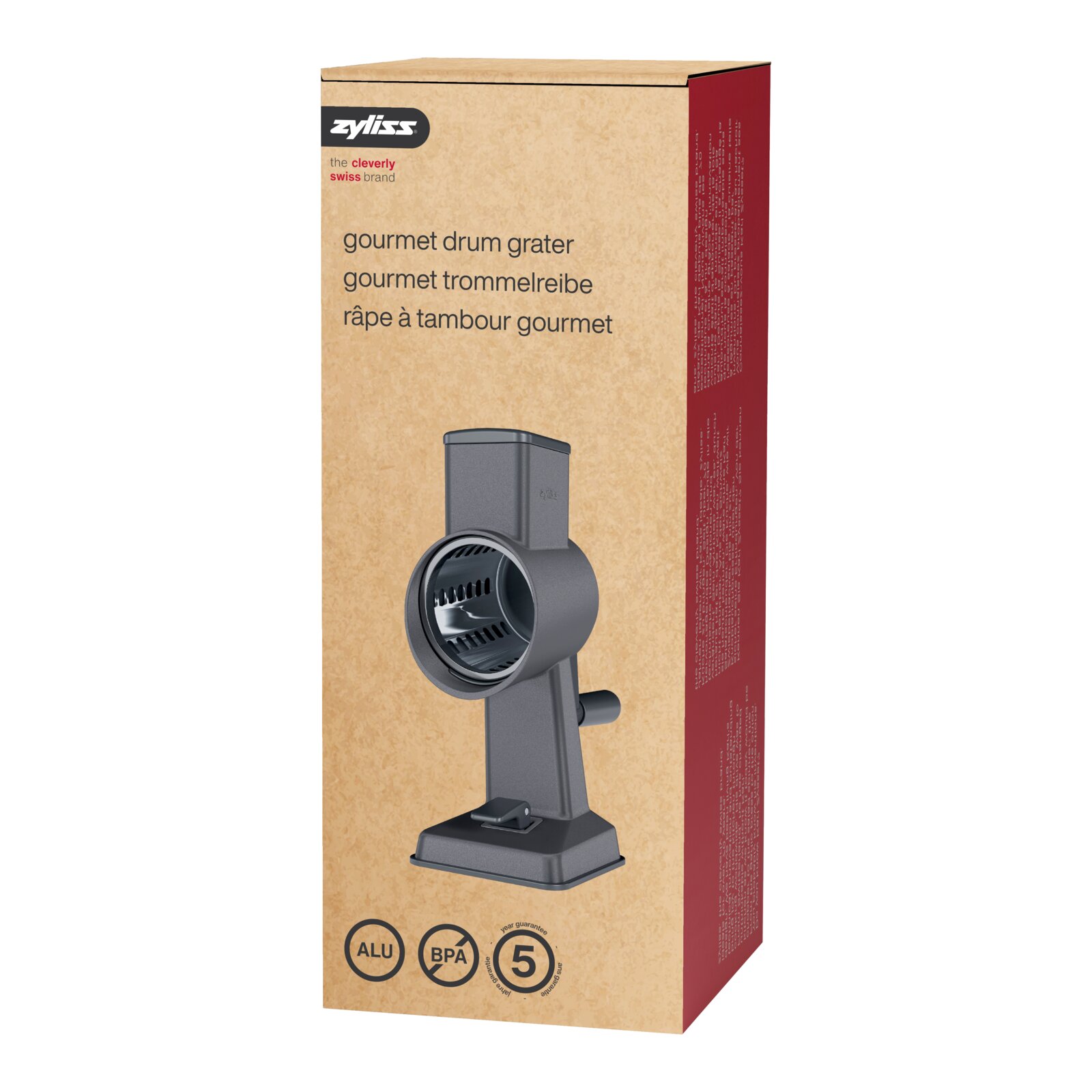 Zyliss Gourmet Trommelreibe (Drum Grater) in Originalverpackung, schräg von vorn/rechts fotografiert, mit Abbild der grauen Reibe auf der Box sowie ALU-, BPA-frei- und 5-Jahre-Garantie-Symbolen